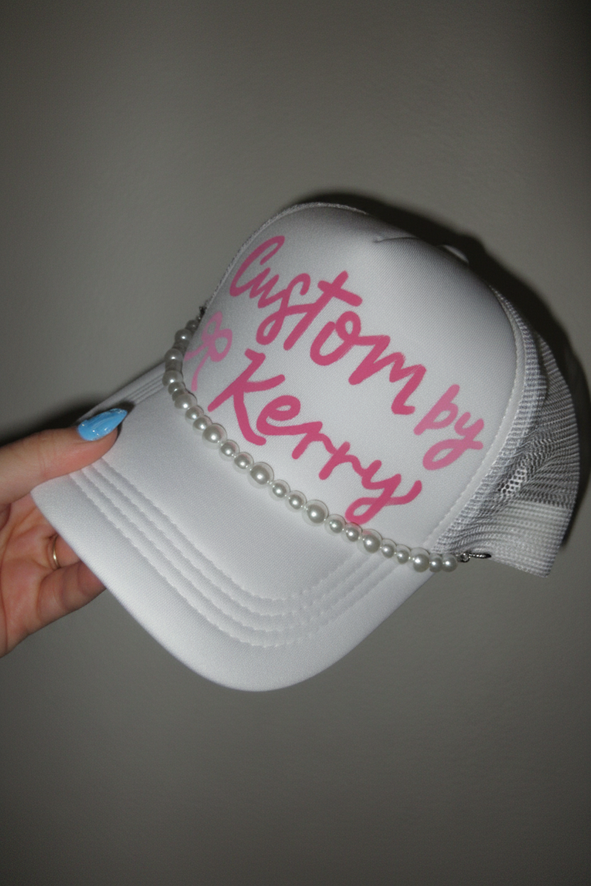 Custom painted trucker hat with pearl trim by Kerry