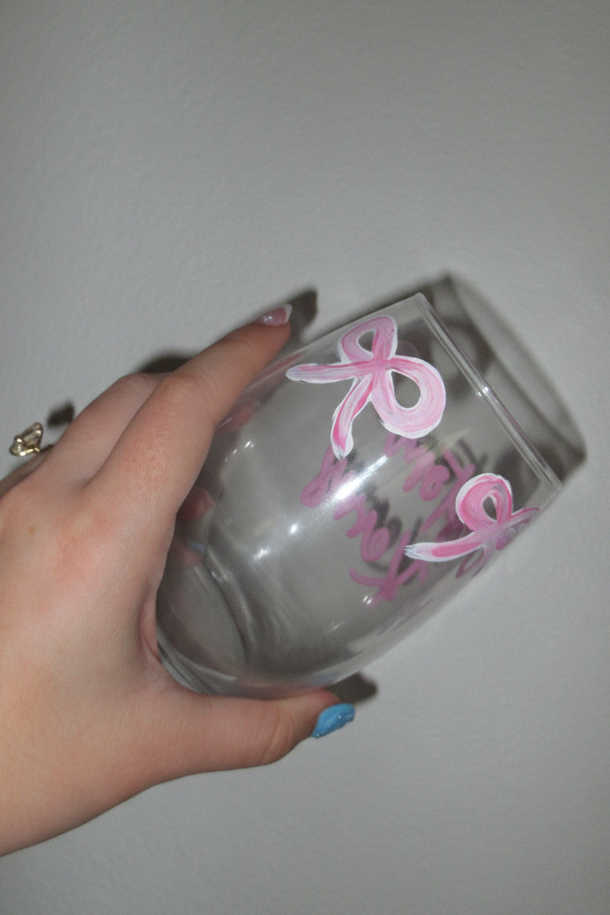 Custom painted stemless wine glass by Kerry - angled view