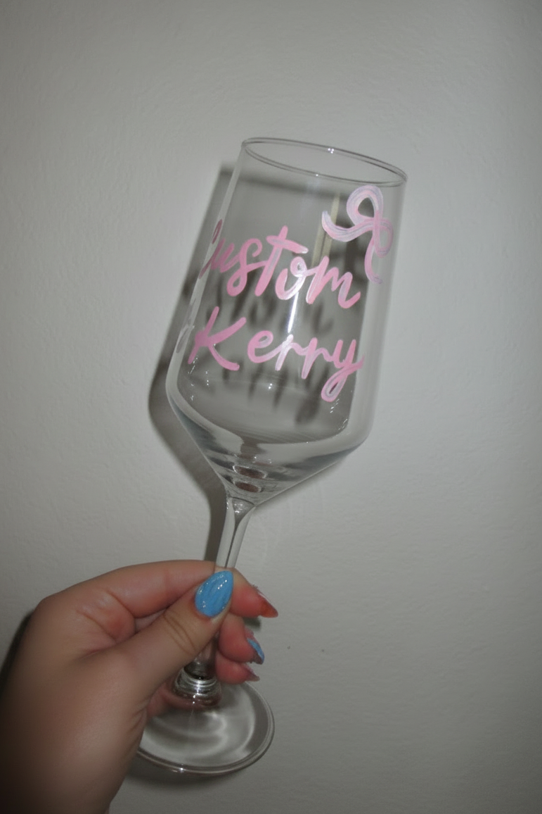 Custom painted stemmed wine glass by Kerry - angled view